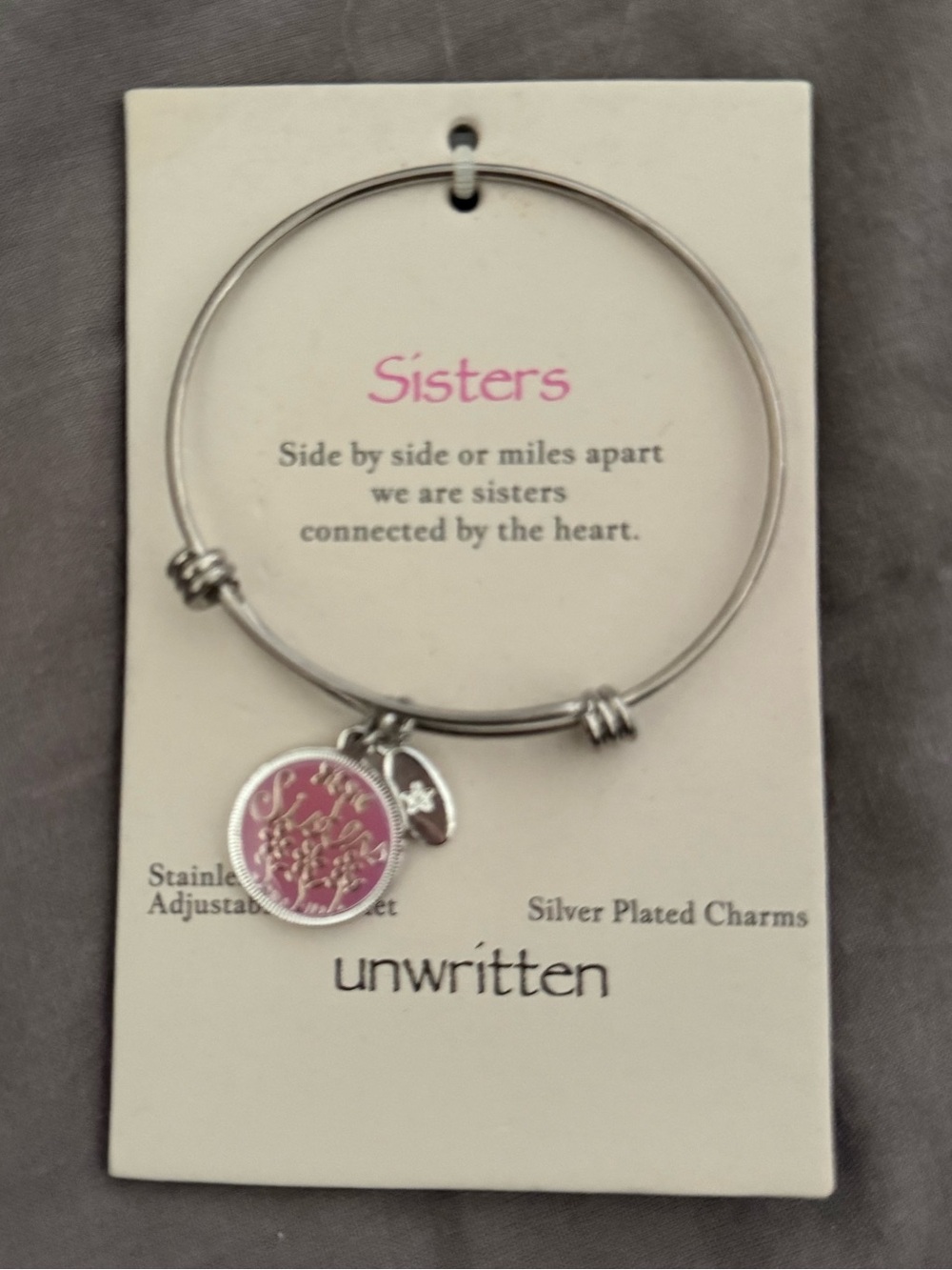 Unwritten Silver-Plated Adjustable Bangle with Pink Sister Charm